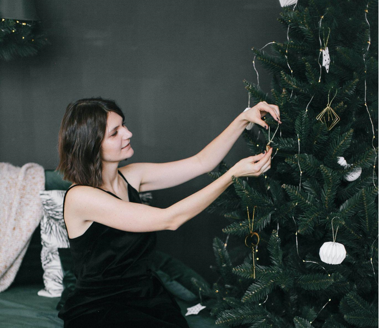 Embracing the Joy of a Skinny Christmas Tree: A Guide to Mindful Decorating with Green Ornaments